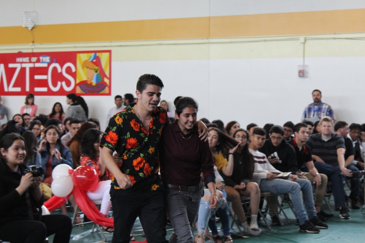 Guadalupe Murillo and Bani Jasso both were seniors, walking to their song for the Senior Signing Ceremony - a tradition that Alta Vista holds for their seniors as a way to show what they plan to do for the future.